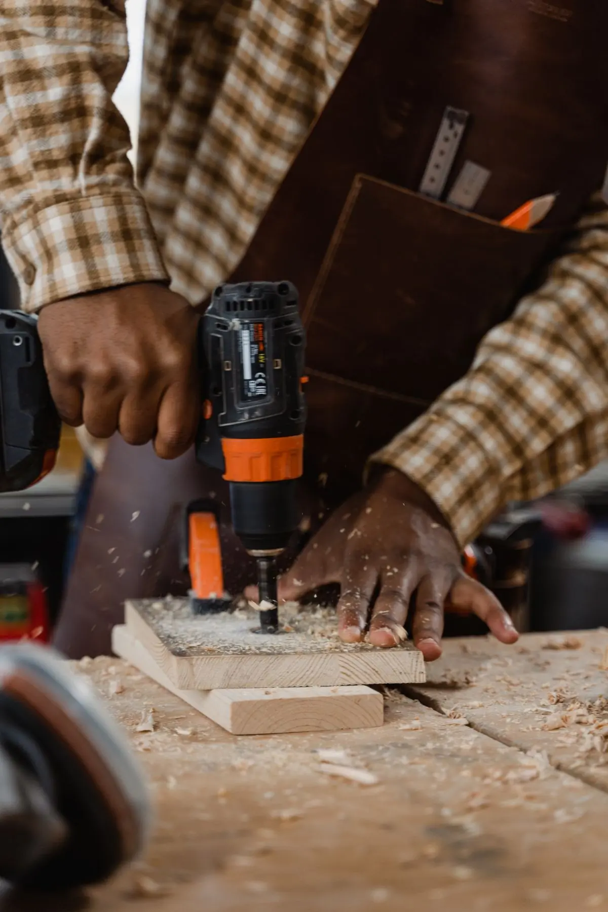 Kwabena Osei at the bench in the workshop