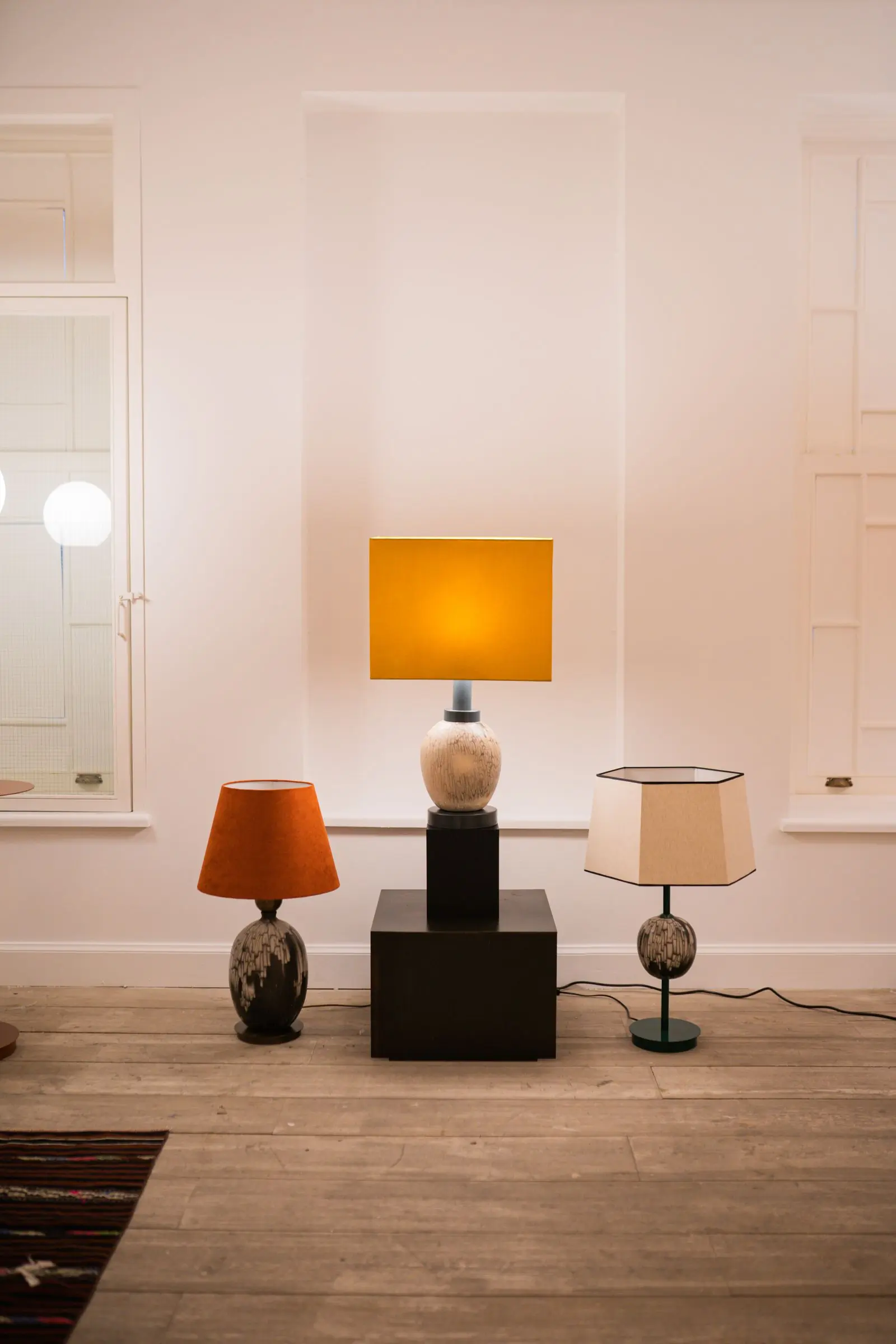 Warm lamps glowing in an evening living room