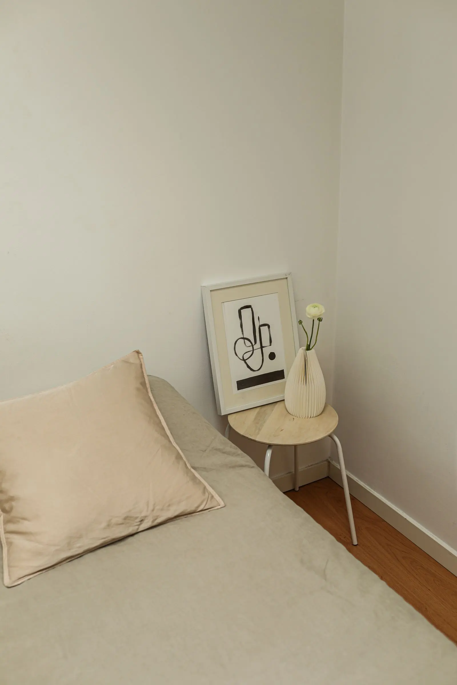 A calm bedroom styled in soft neutral linen