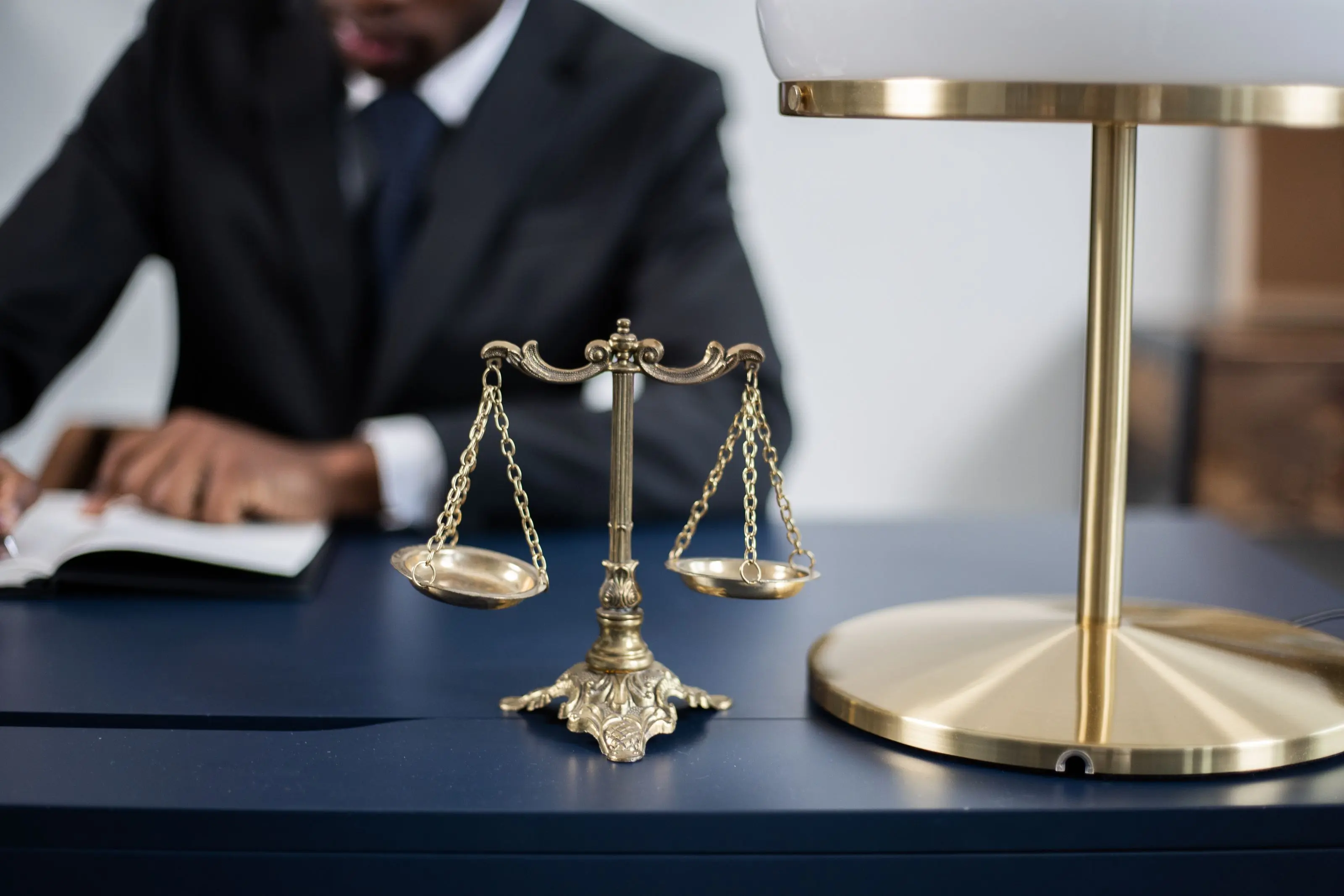Scales of justice on a partner's desk