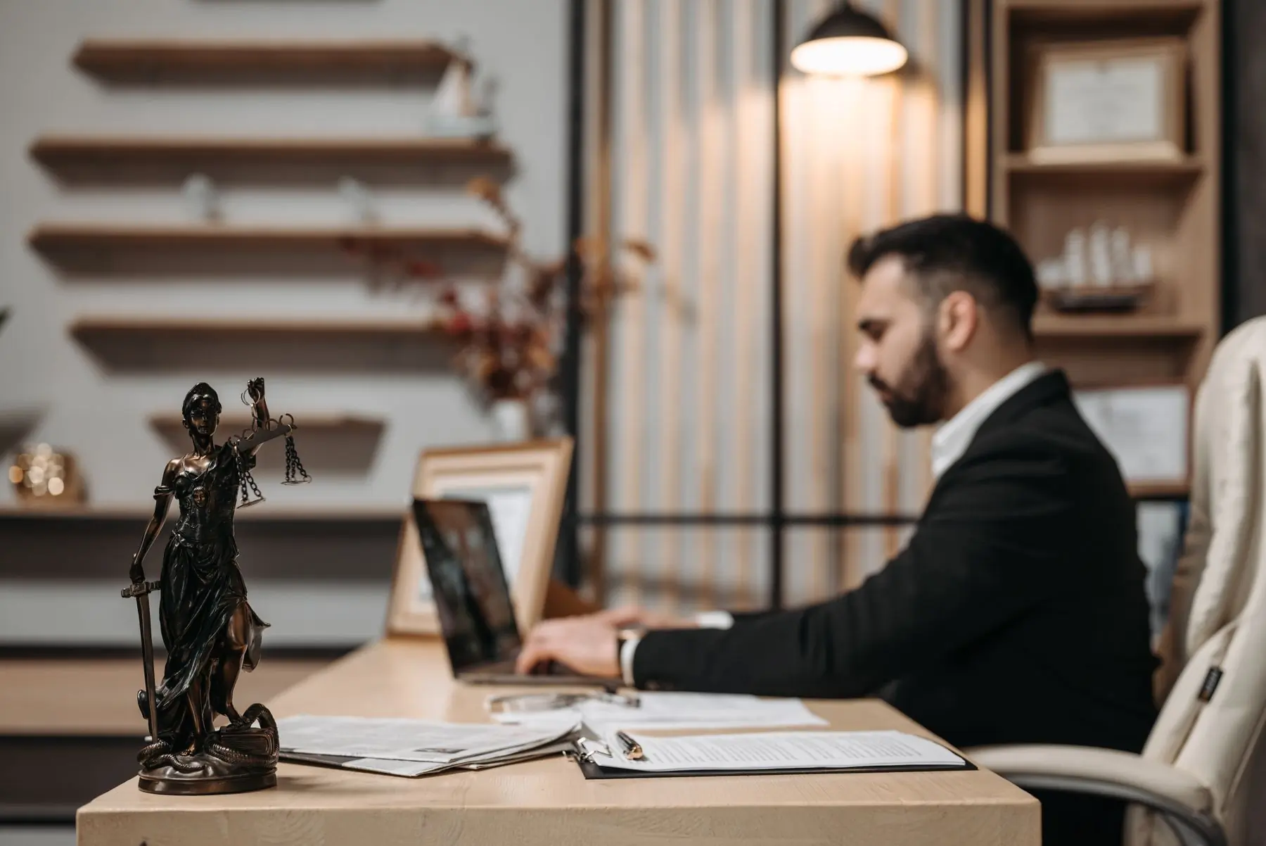 A lawyer reviewing an injury claim file