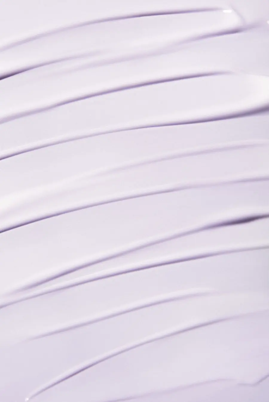 Pale lilac cream drawn into ridges, filling the frame