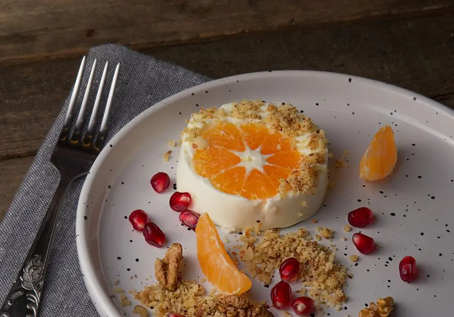 Panna cotta plated with orange segments
