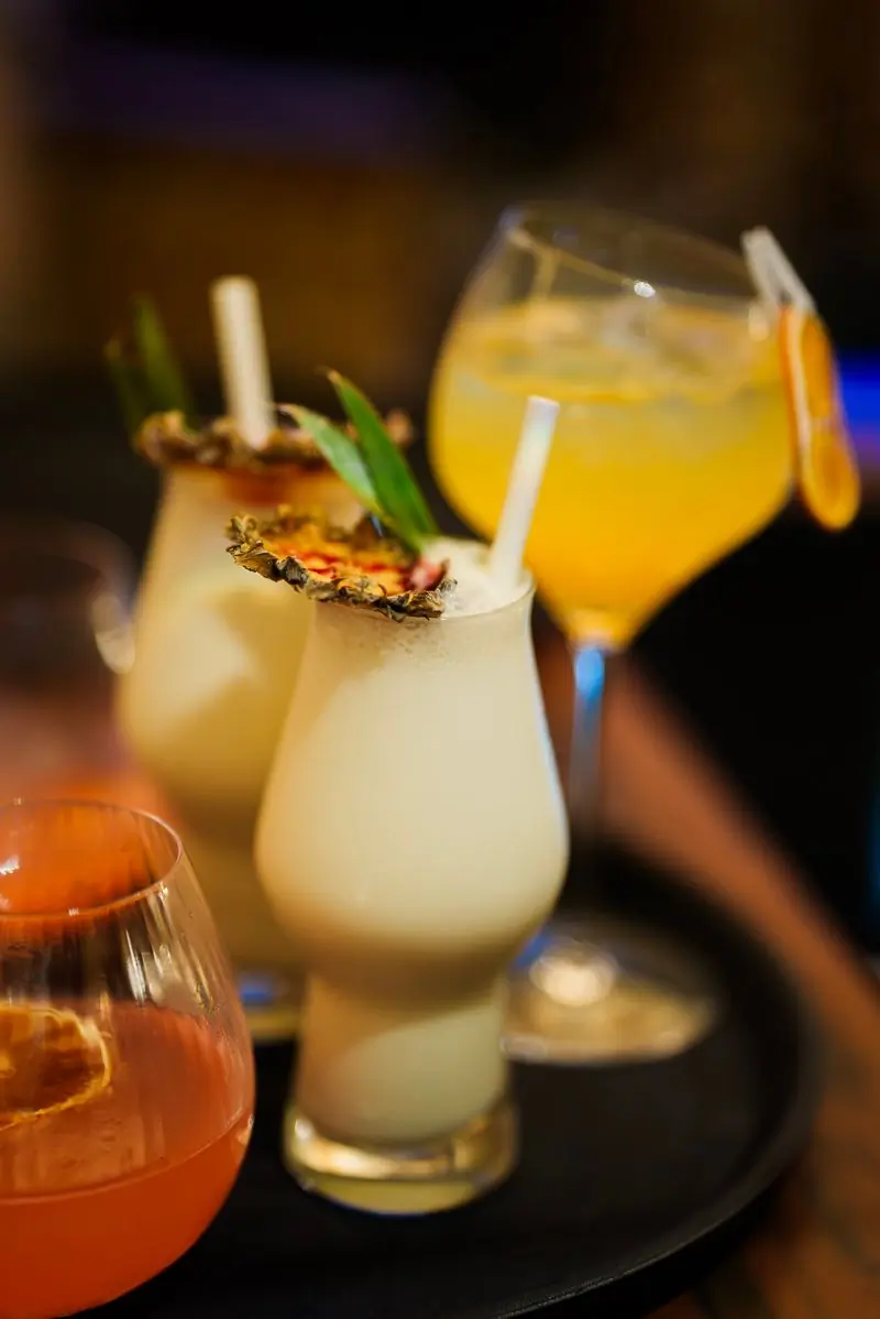 A pineapple cocktail with a garnish