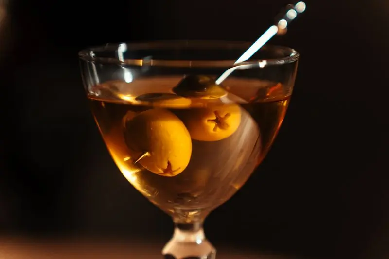 A martini with olives