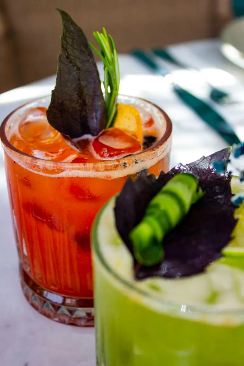 A spiced cocktail garnished with cucumber