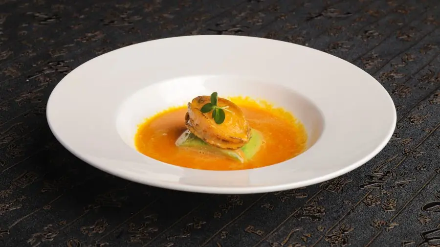 A bowl of fish in a warm broth