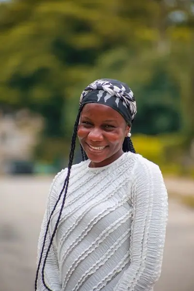A guest smiling outside the restaurant