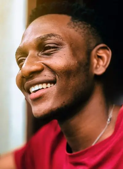 A guest laughing at the table