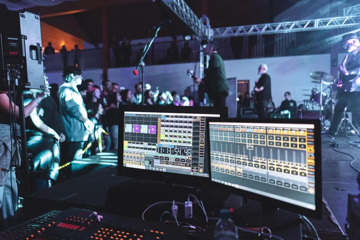 A sound engineer working front of house at a live show
