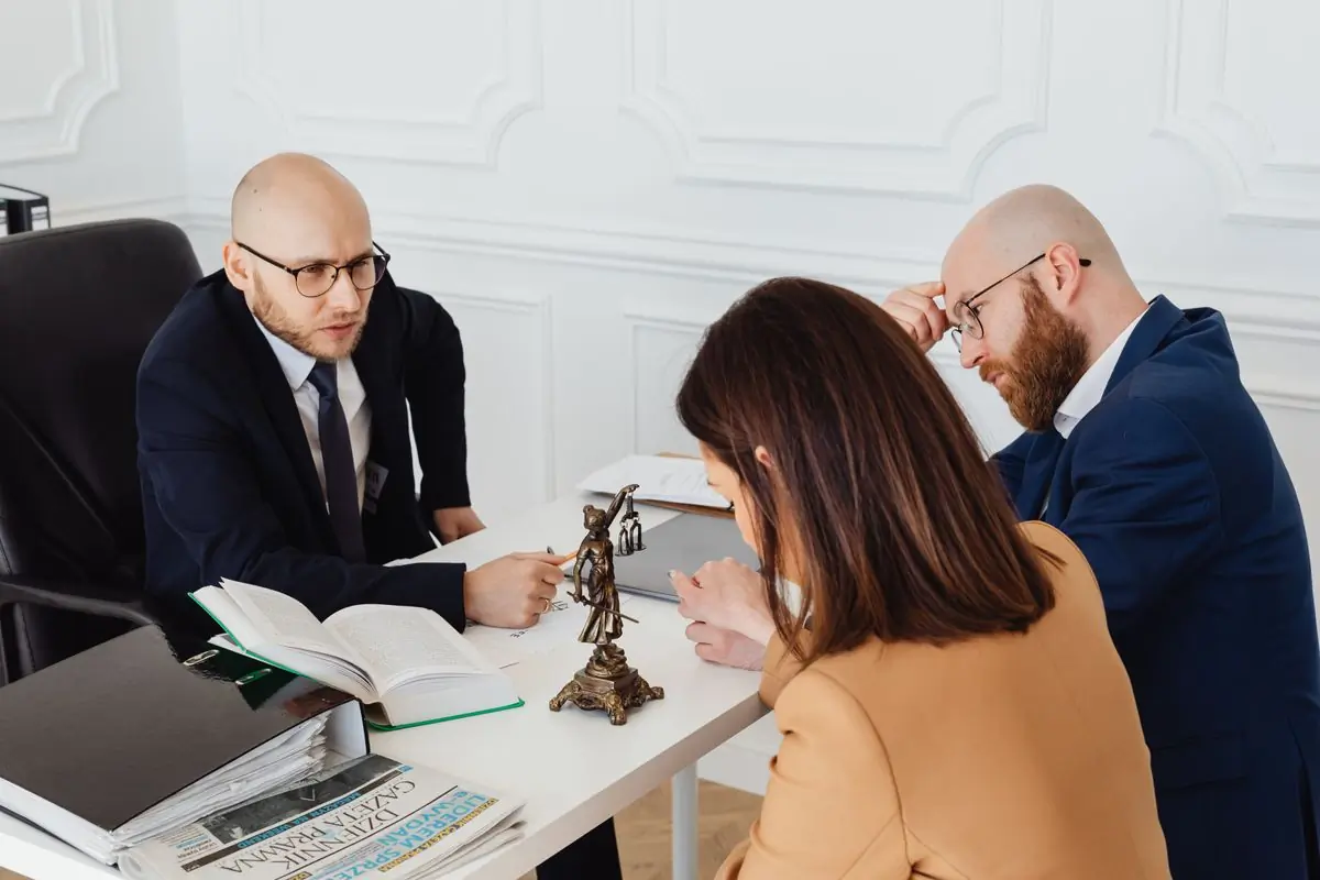 An advocate talking a client through a family matter