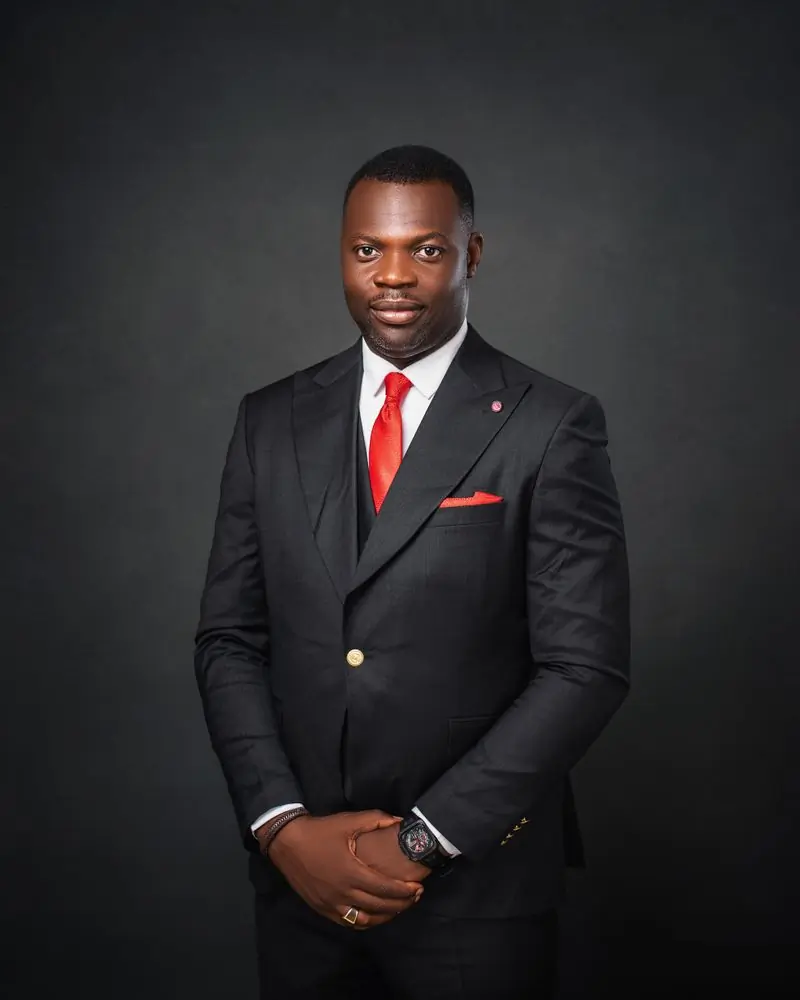 Yaw Otu Danquah in a dark suit