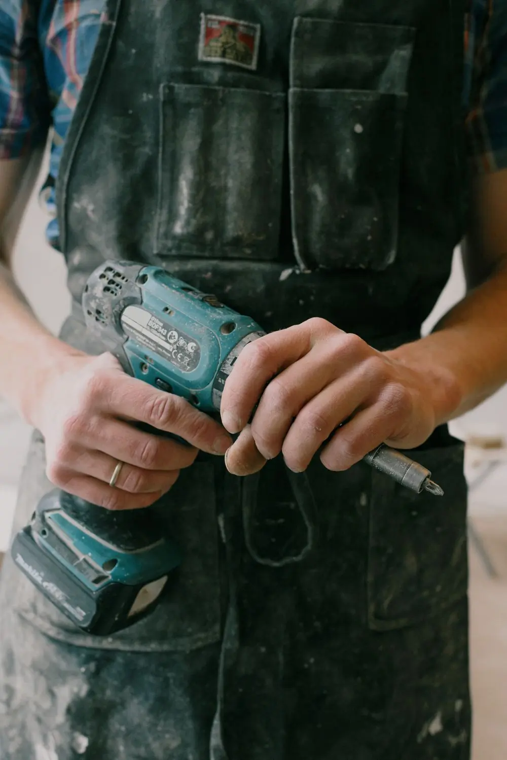 A tradesman's drill and work apron