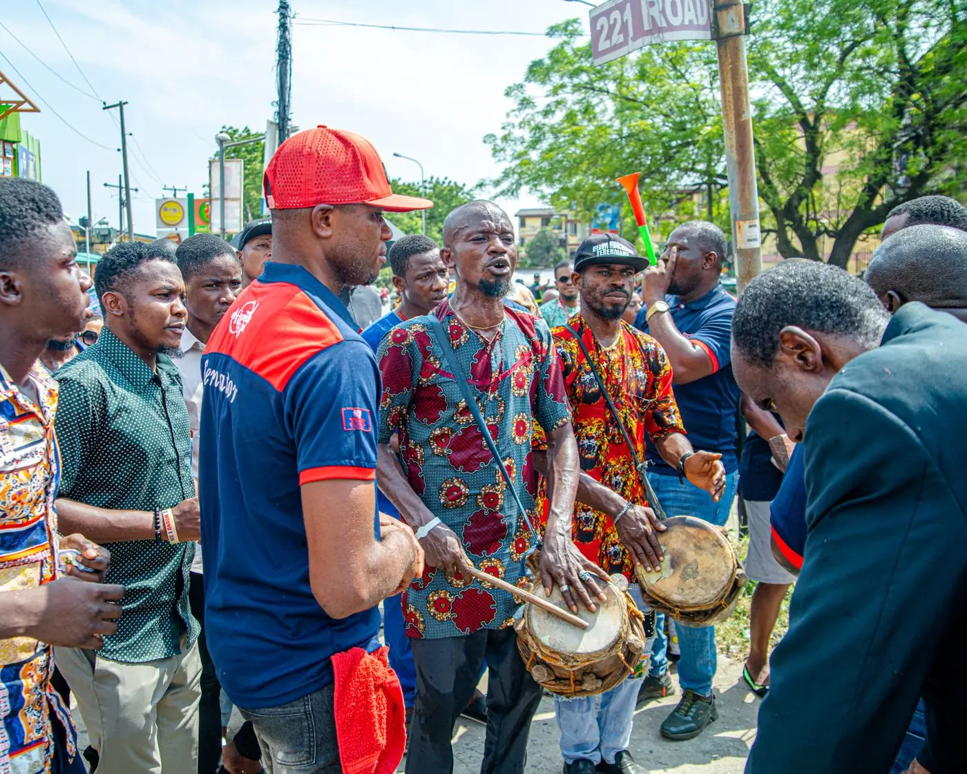 Street musicians drumming together at the festival