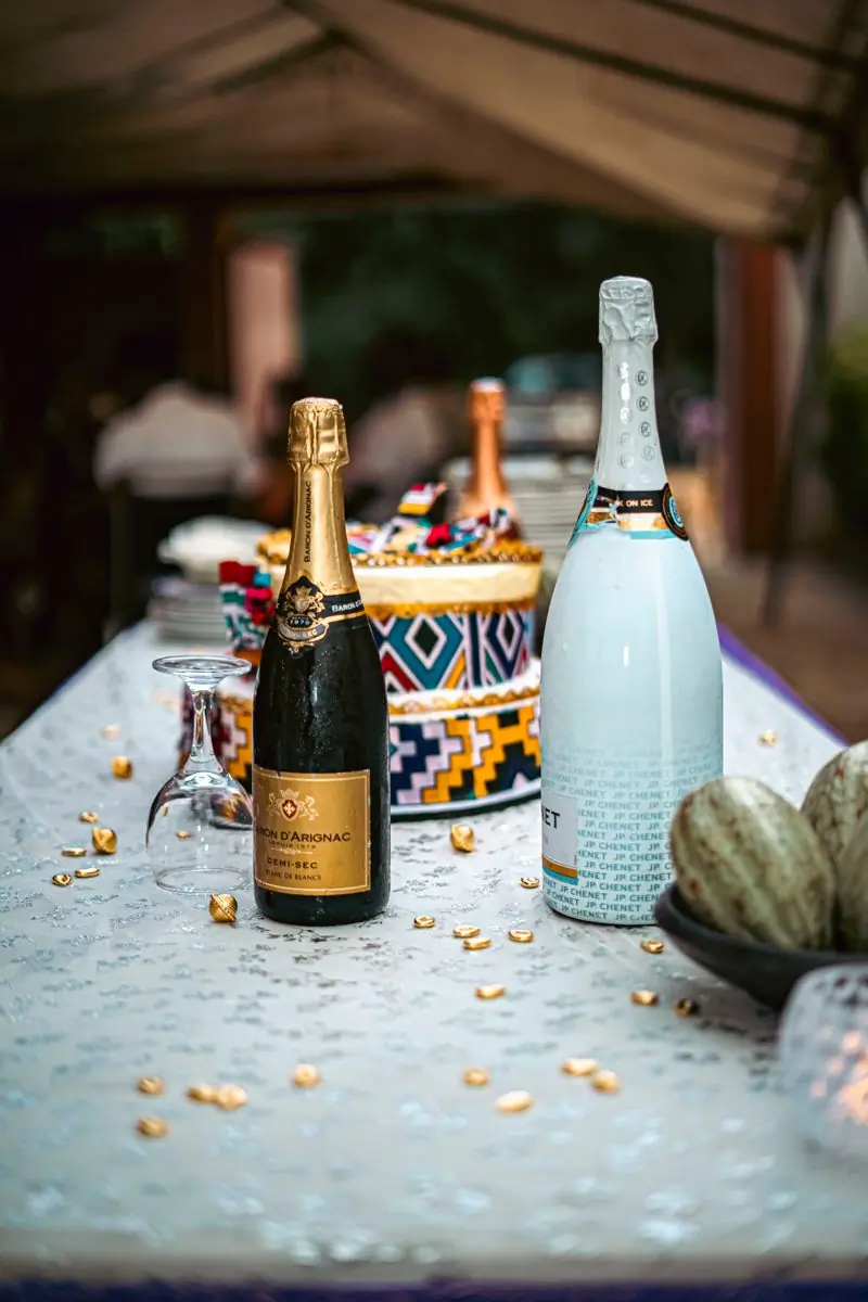 Champagne cooling in a beaded ice bucket at a reception