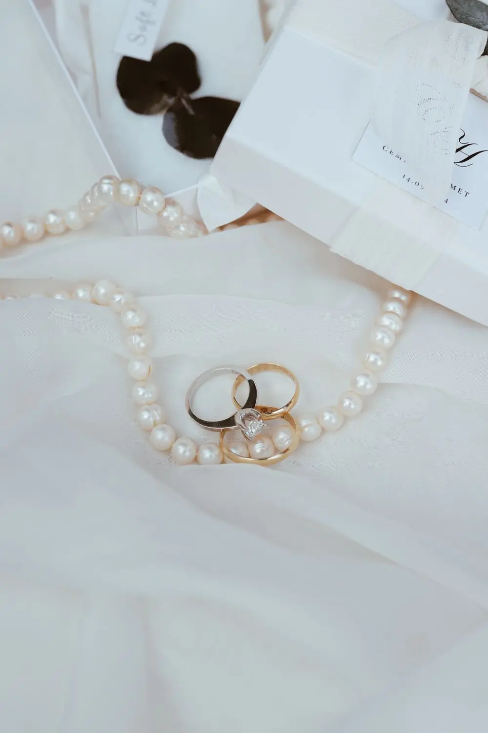 A pair of matched gold wedding bands resting together
