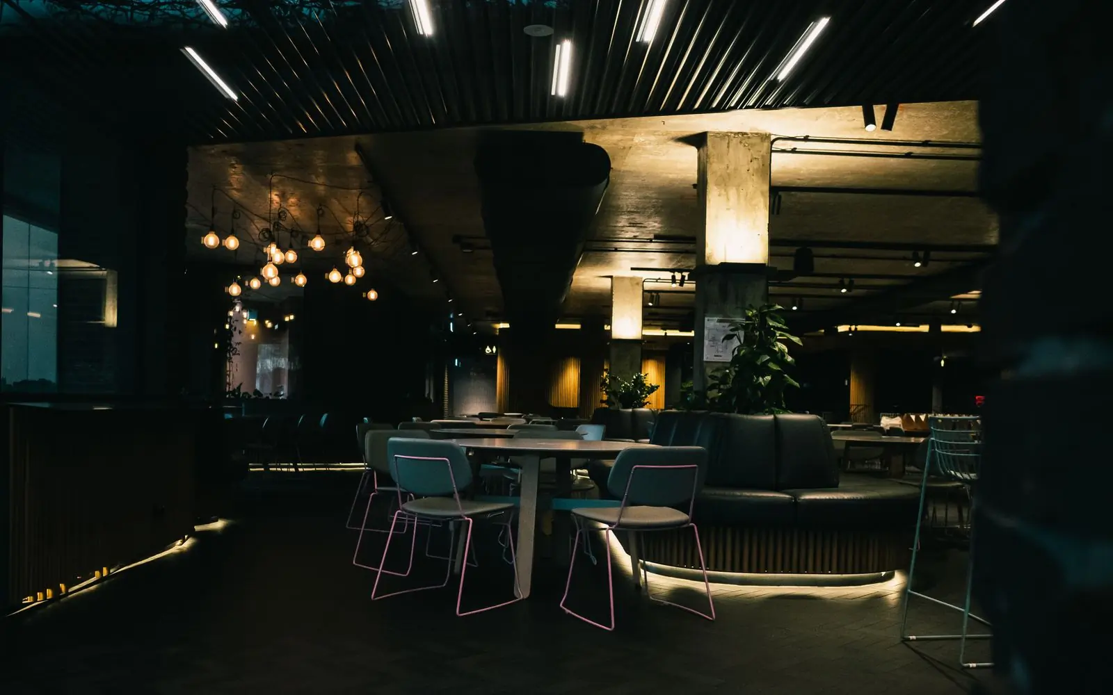 The dining room at Feast, lit and empty before service
