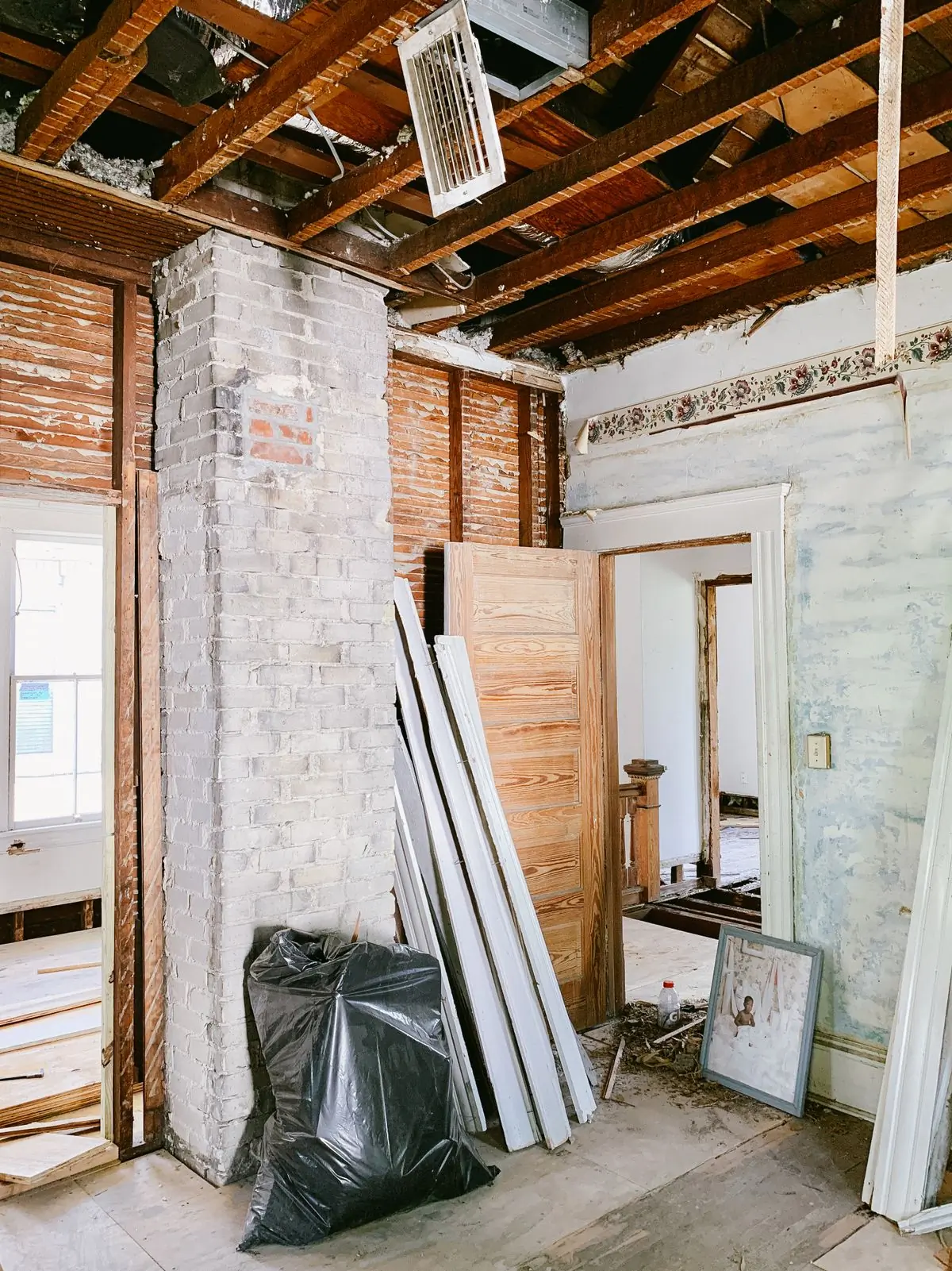 A gutted interior mid-refurbishment with its timbers exposed