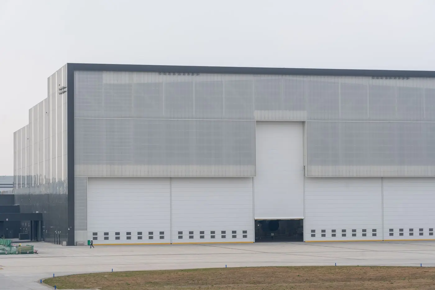 A completed industrial shed with its loading doors closed