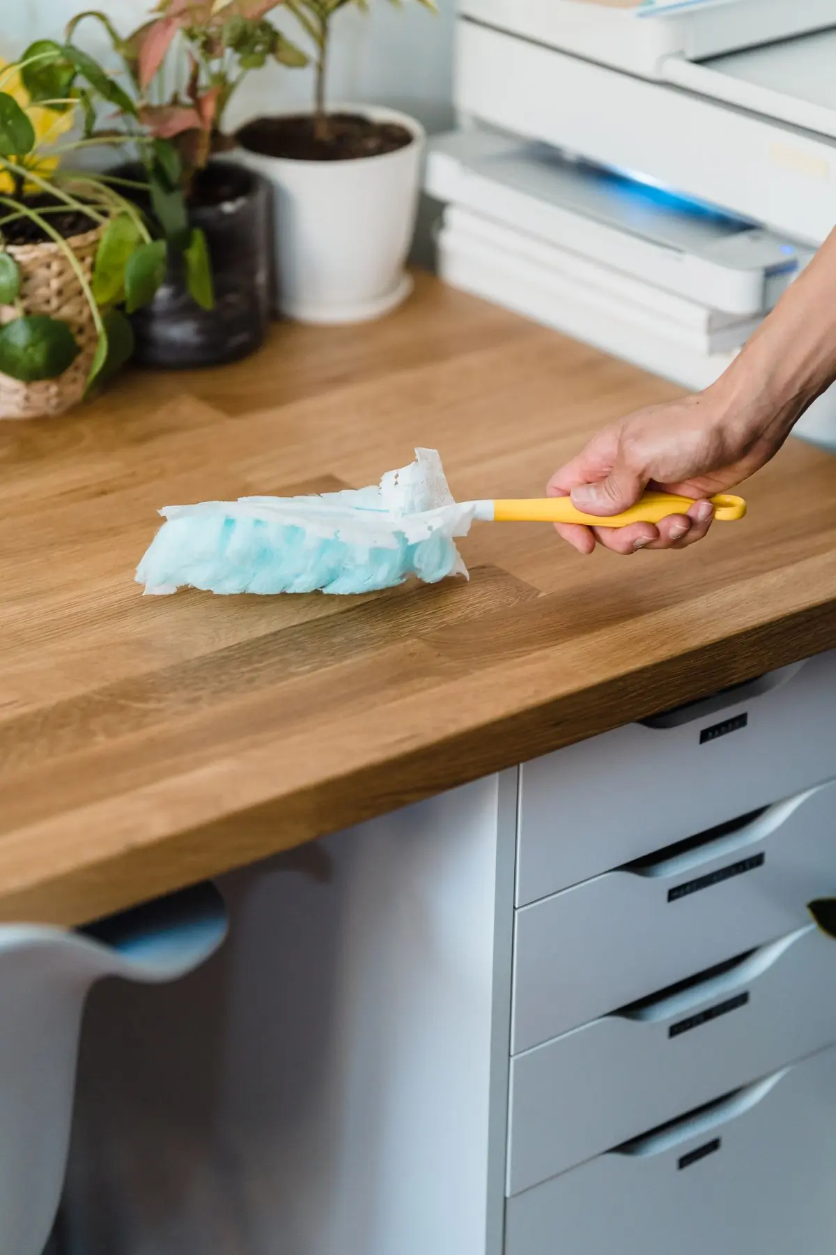 A duster running along a wooden worktop