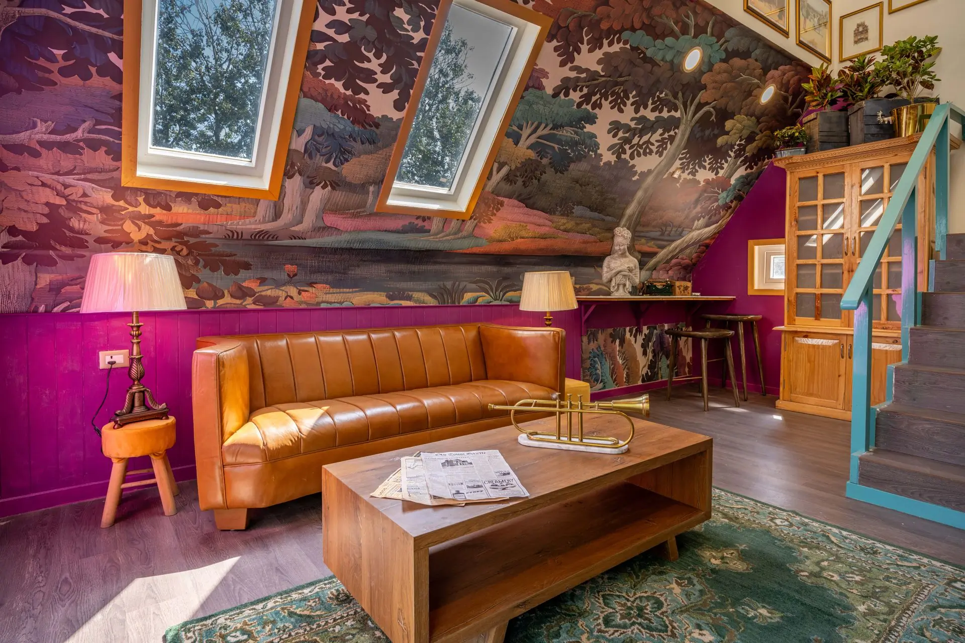 A sitting room finished by the firm, its ceiling painted as a mural