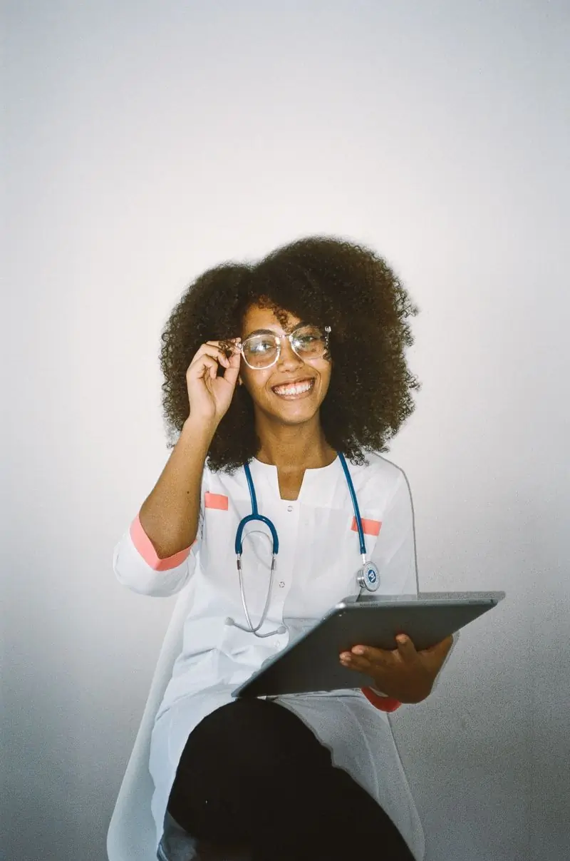 Portrait of a paediatrician holding a tablet