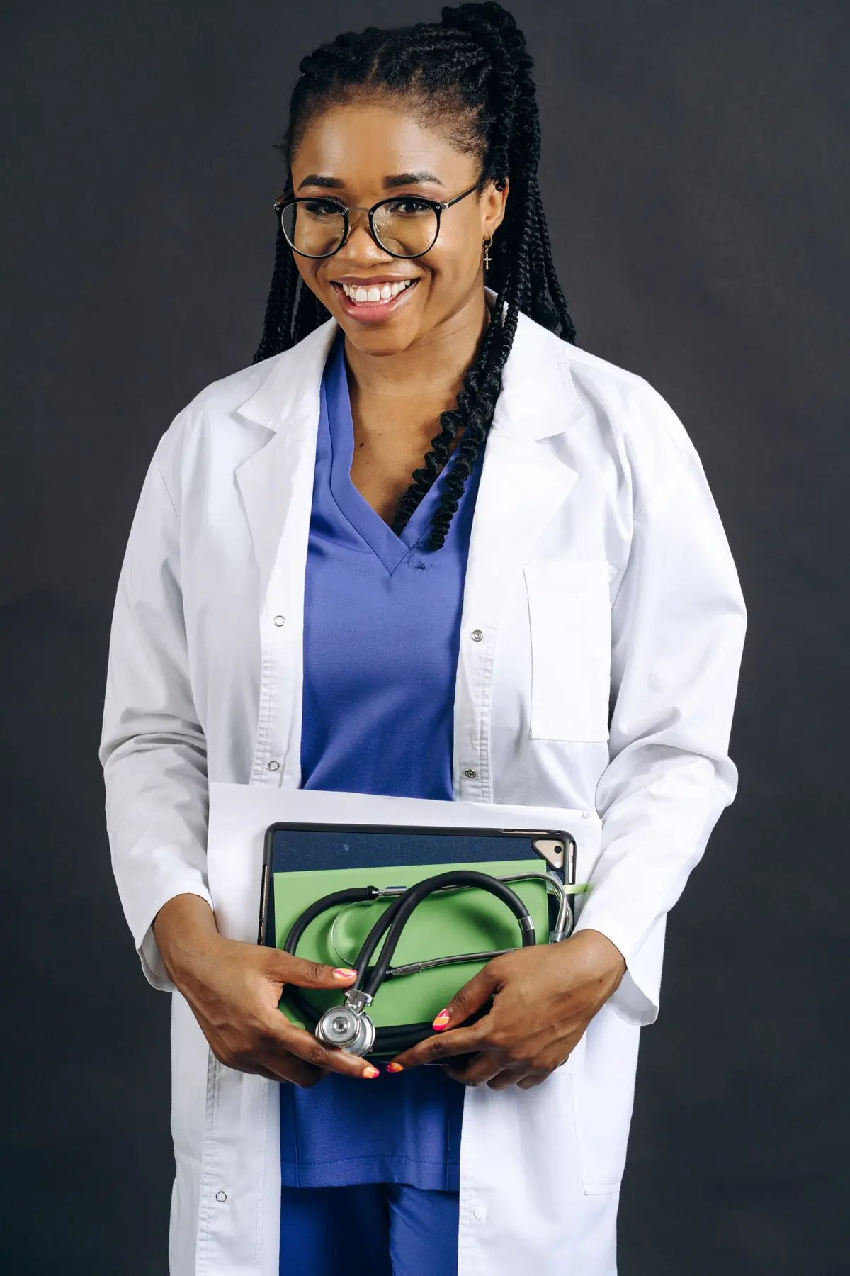 A doctor holding a patient's file at the clinic