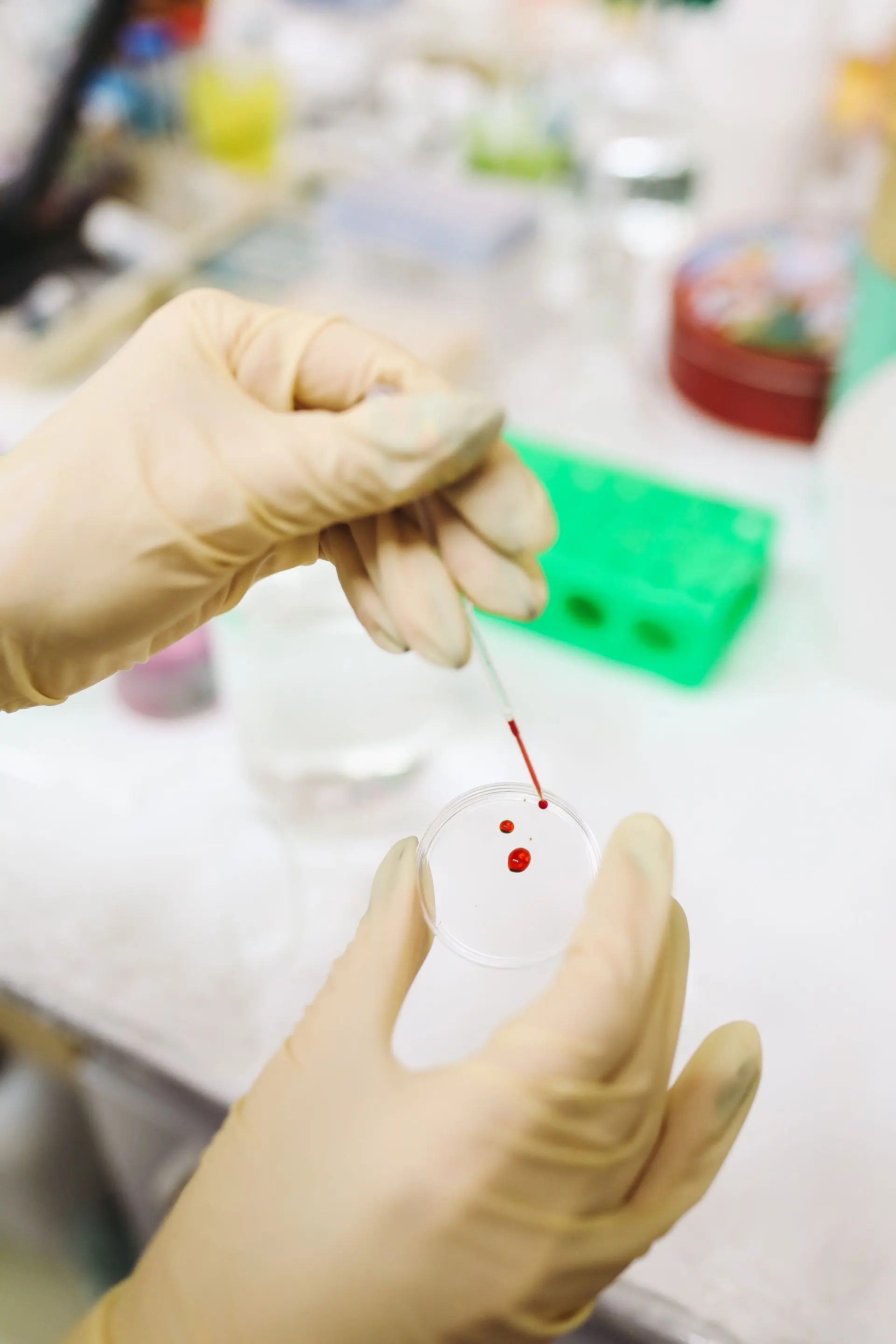 A laboratory scientist preparing a blood sample at the clinic