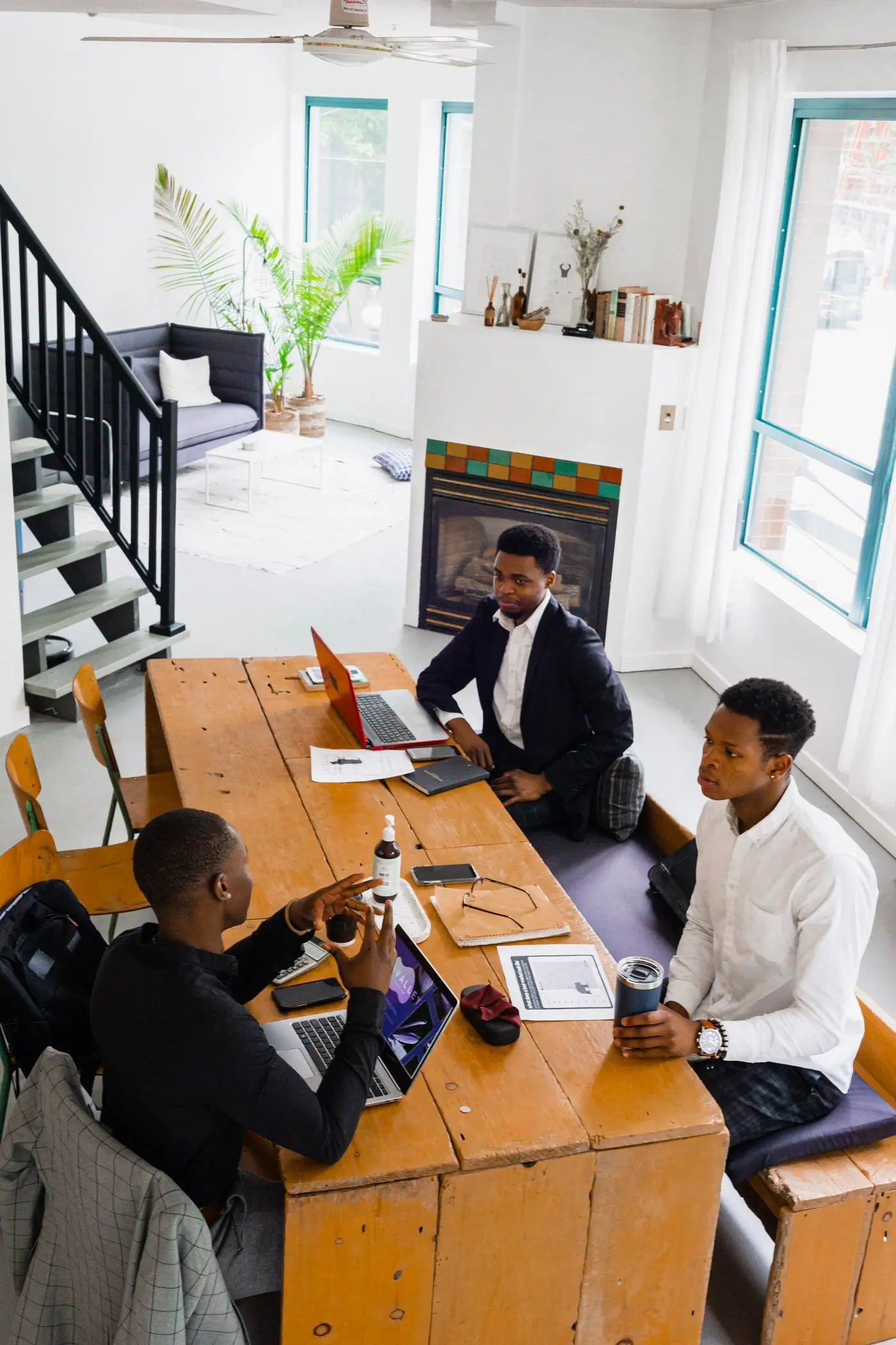 A team working around a table in an office being relocated
