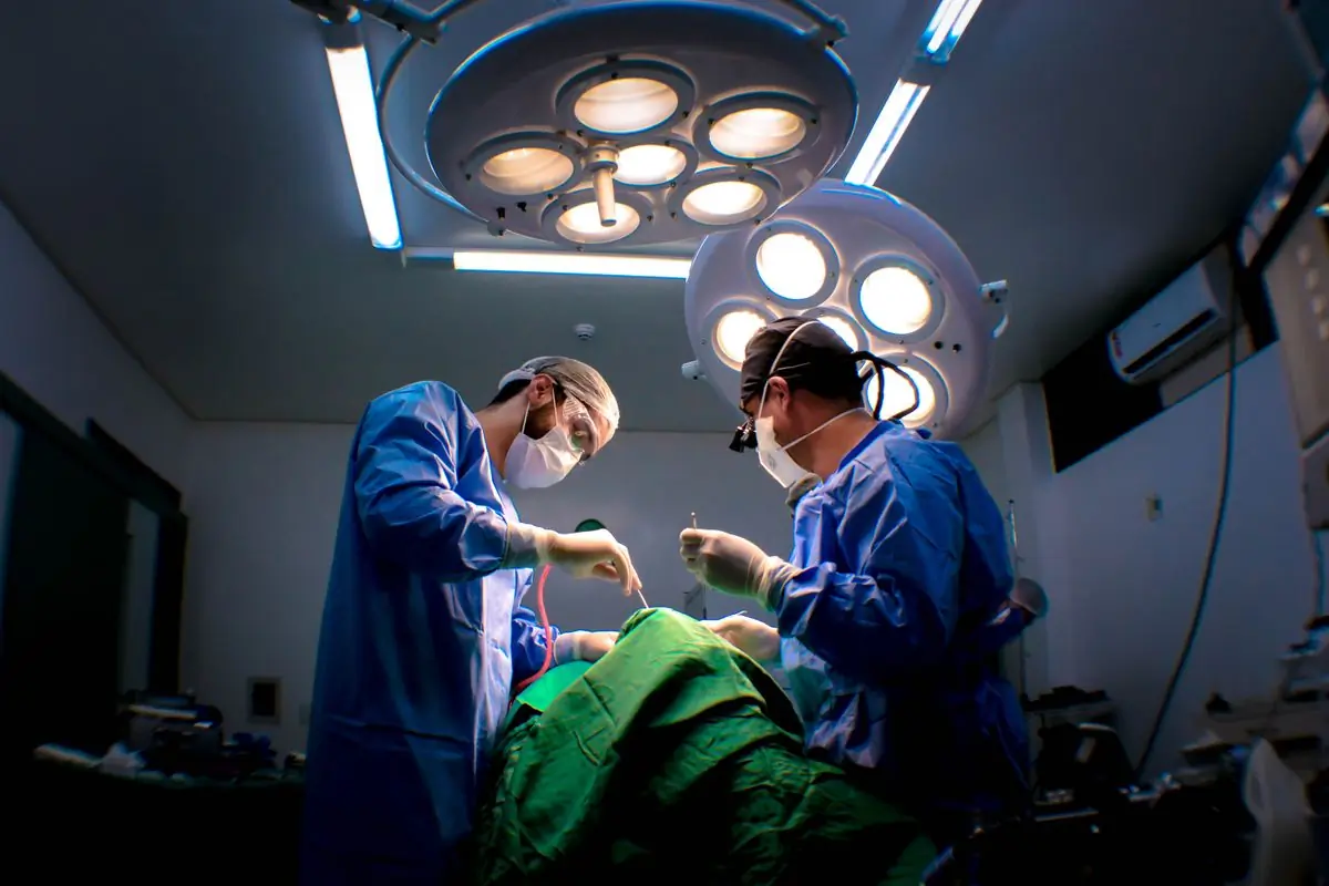 A surgical team mid-procedure in one of the hospital's theatres