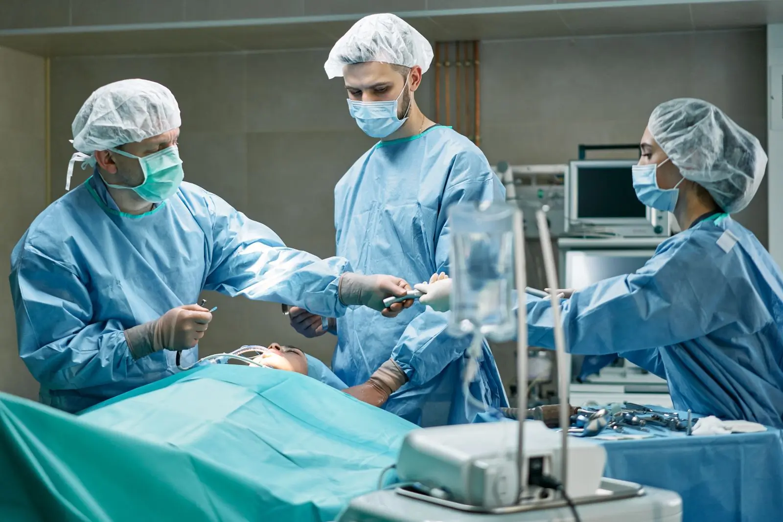 A surgical team at work in one of the hospital's four theatres
