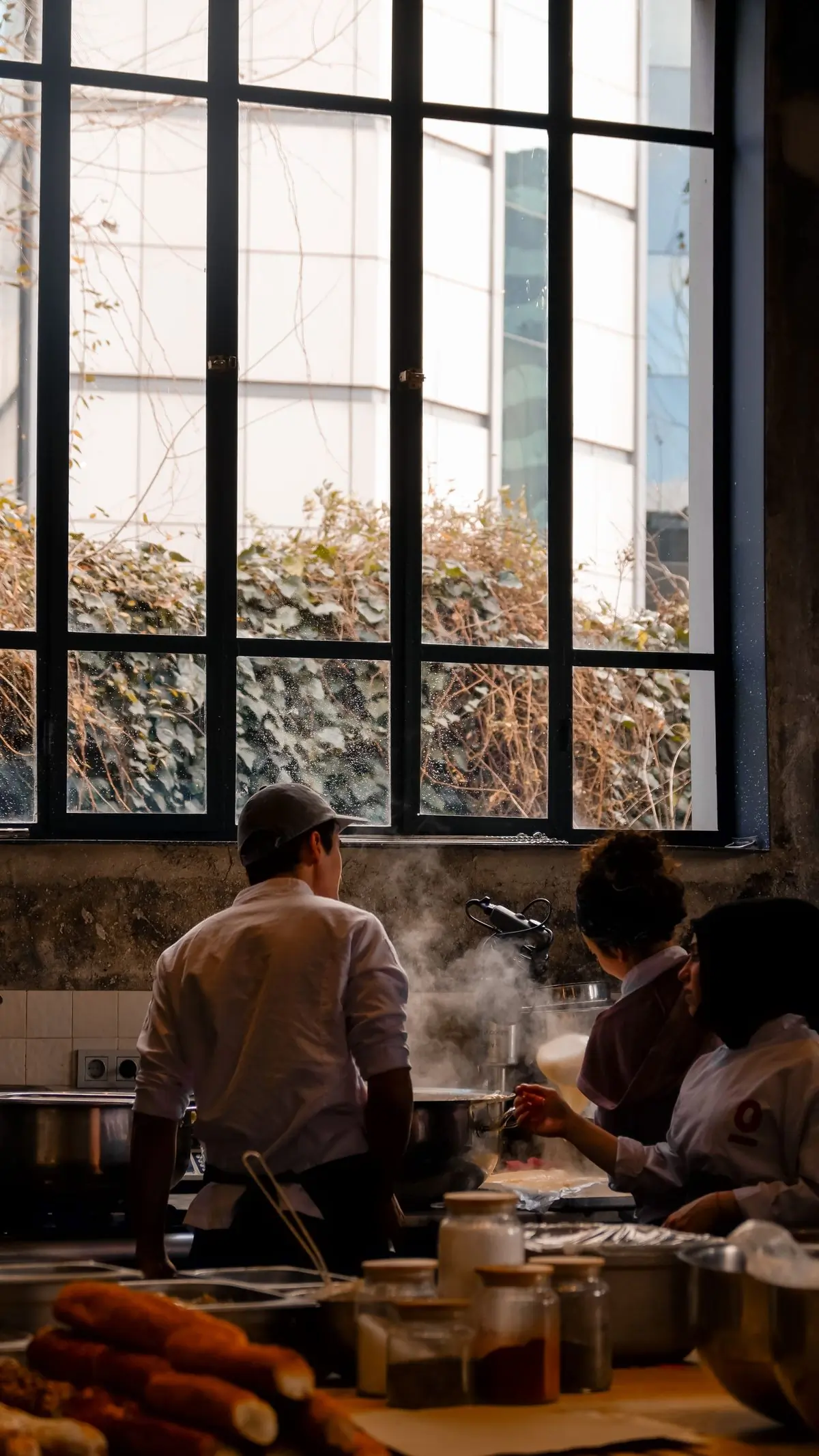 Cooks working the line in the kitchen at Hearth
