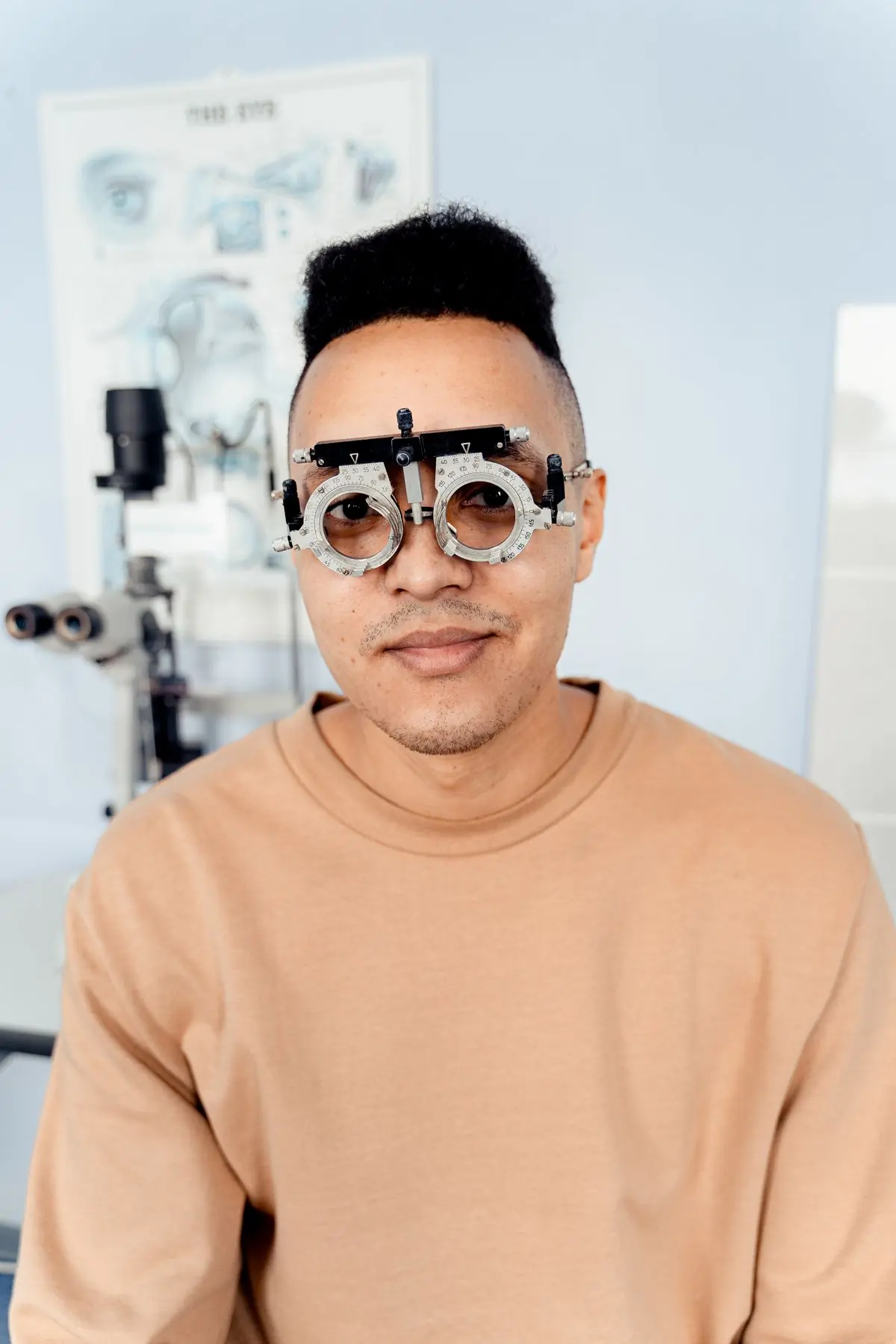 A patient in a trial frame during a refraction at the eye clinic