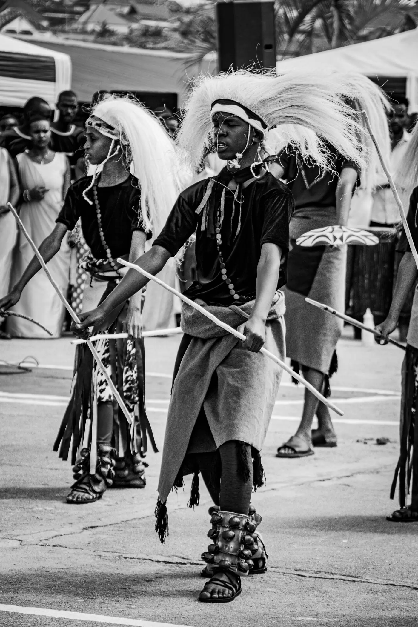 Traditional dancers performing, photographed in black and white