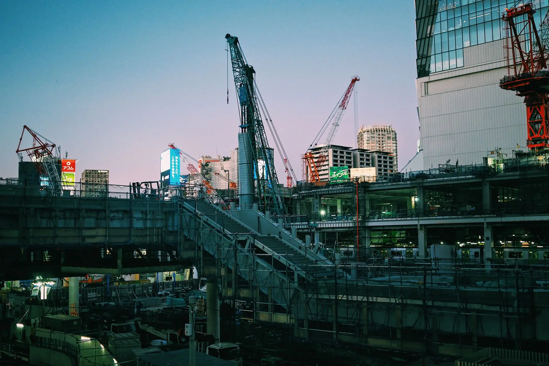 A city construction site at dusk