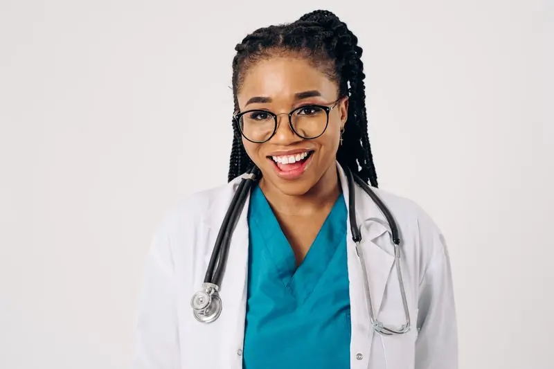A doctor at the centre photographed in her white coat