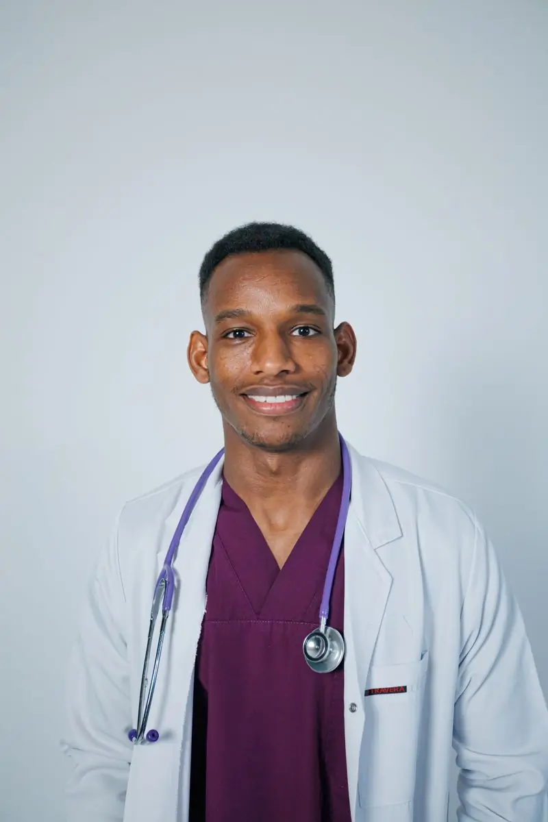 A cardiologist at the centre photographed in scrubs