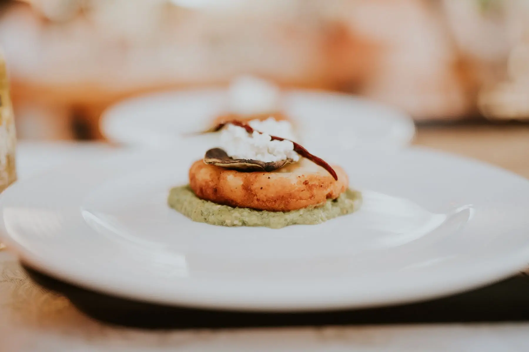 A single scallop plated at the pass