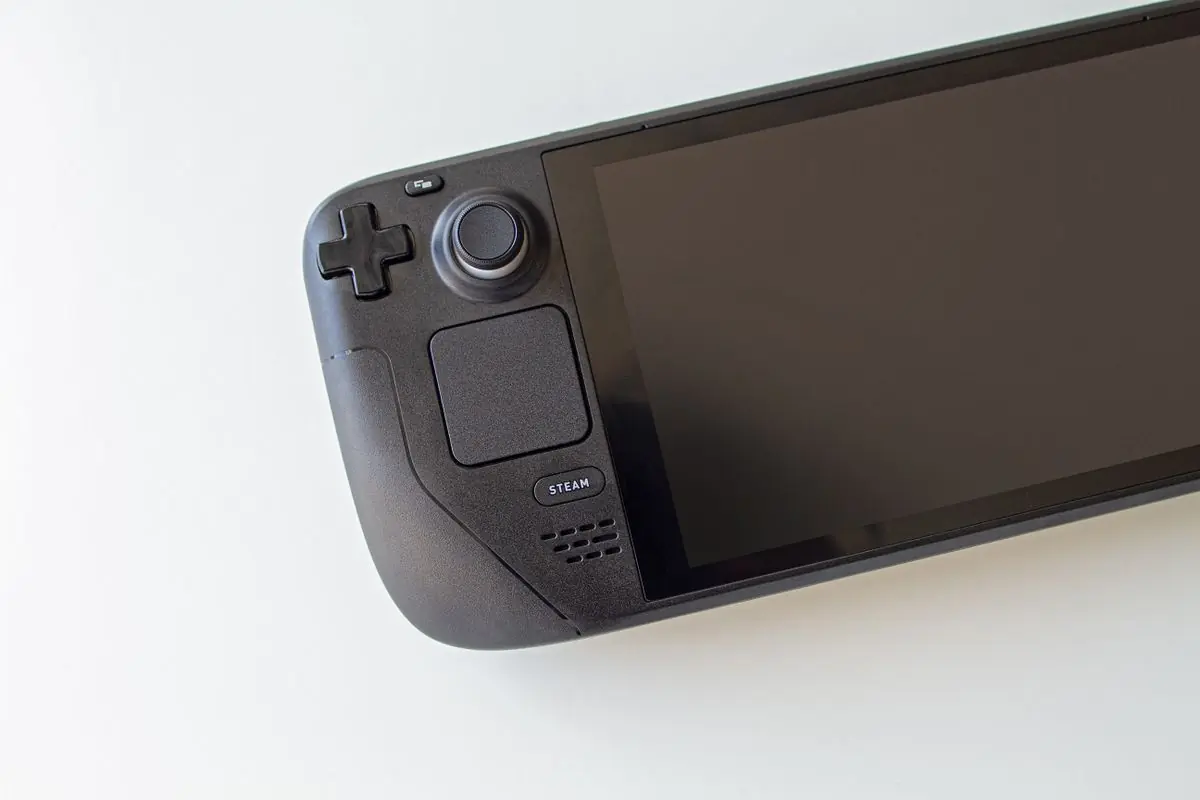 A handheld games console photographed on white