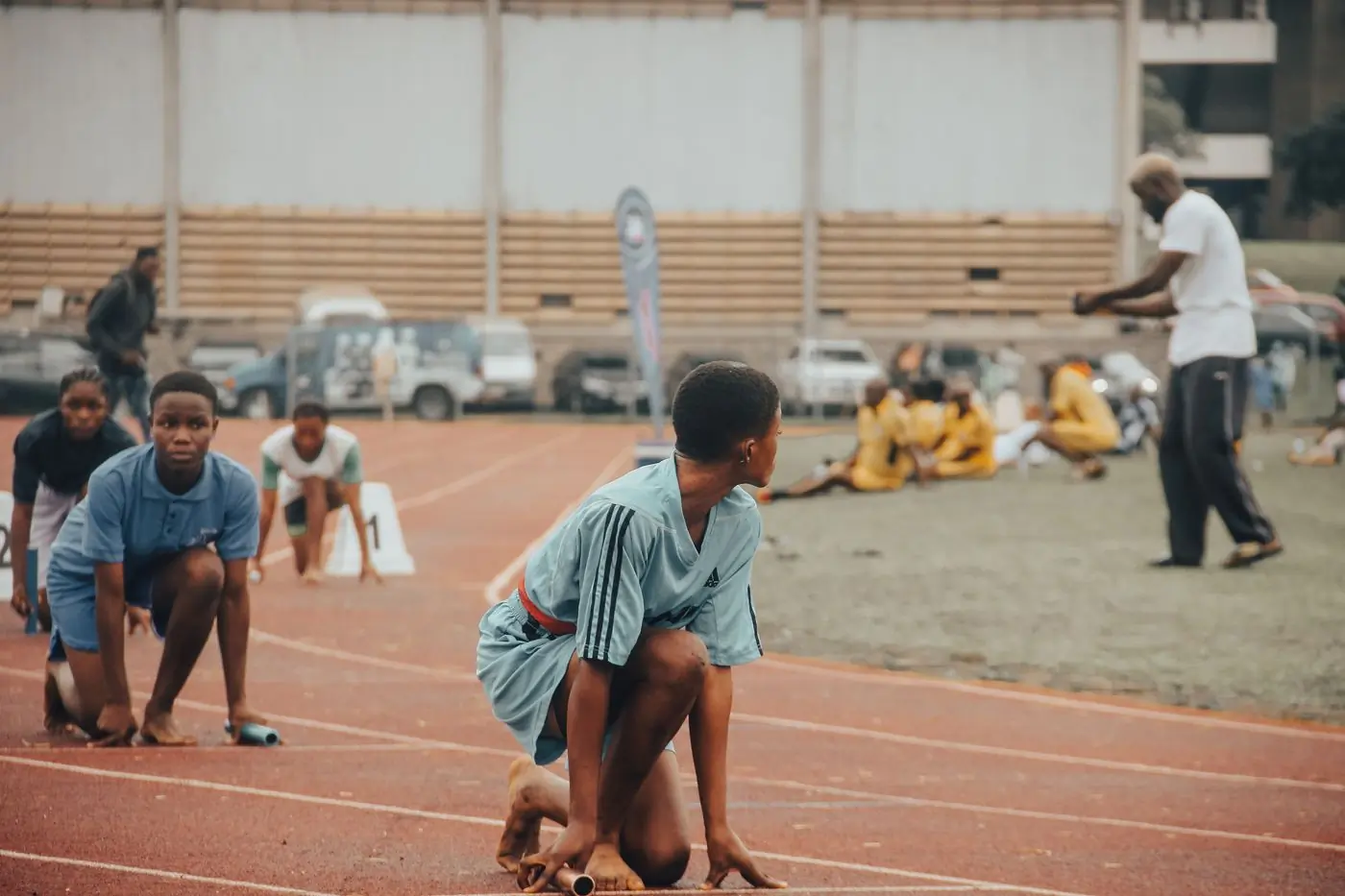 Campers set in the blocks at the start of a sprint
