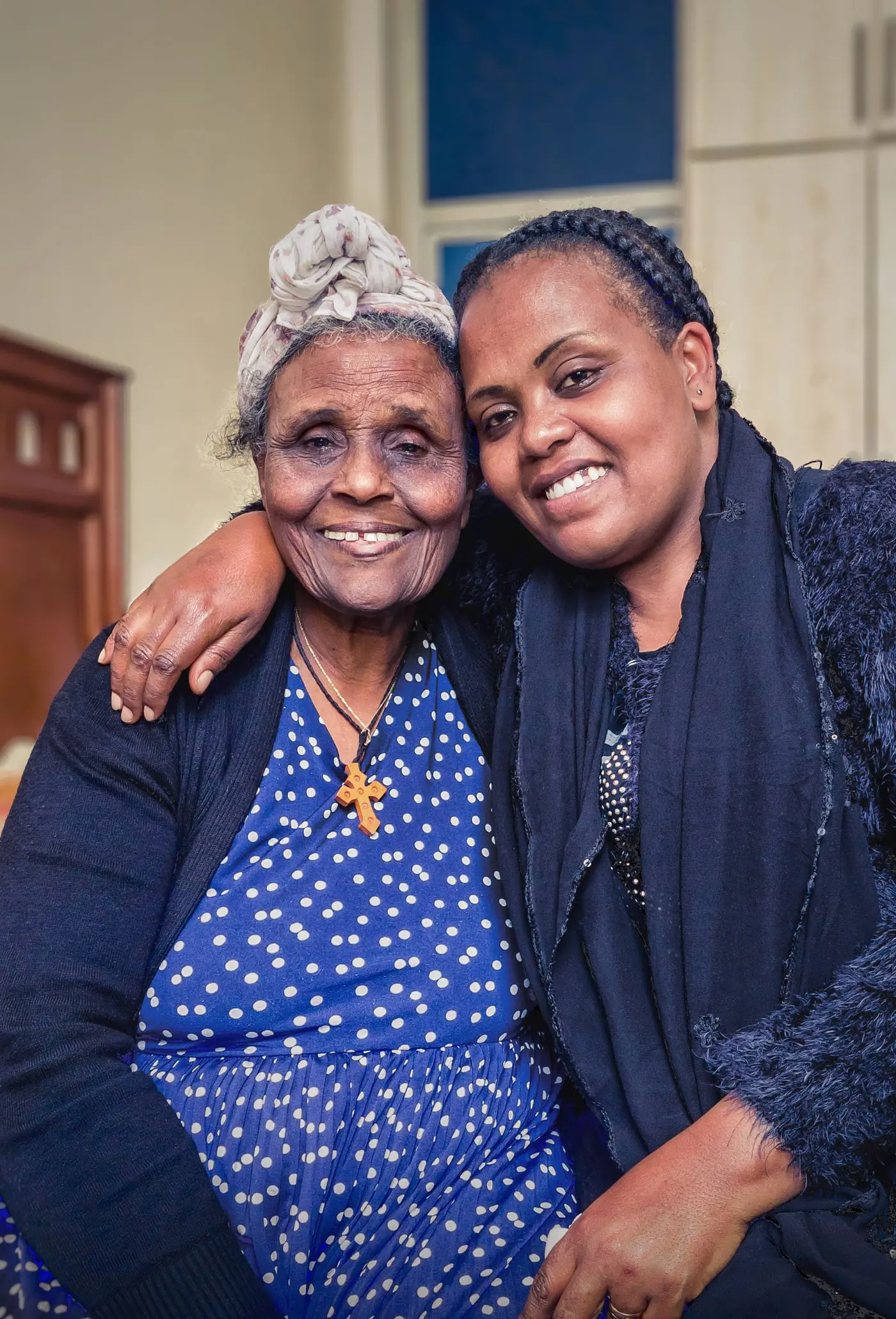A patient of the centre with her granddaughter