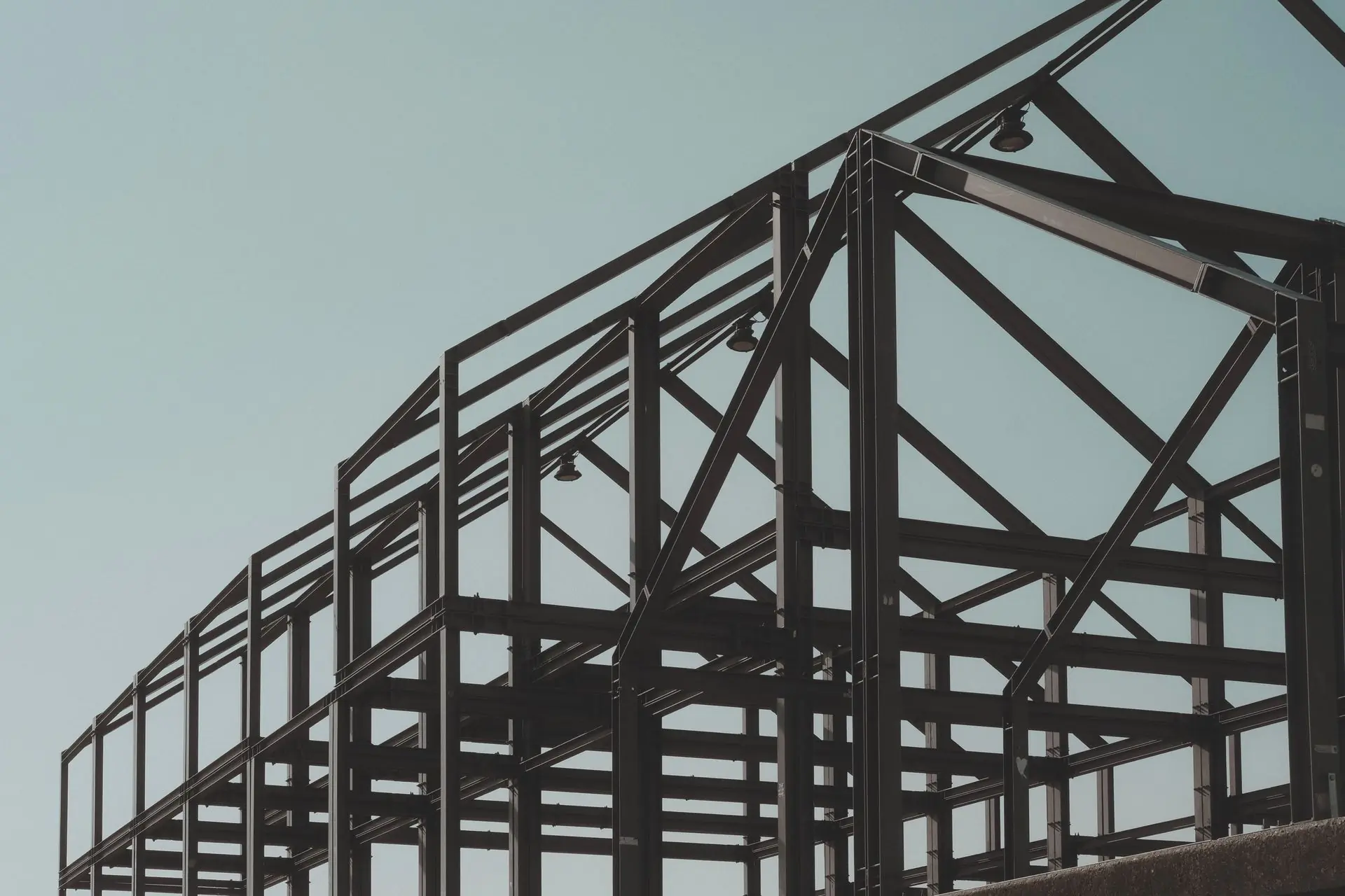 A steel frame going up against a clear sky