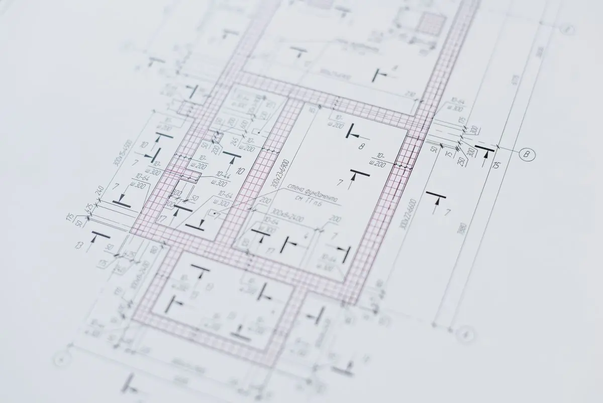 A floor plan laid out on a table