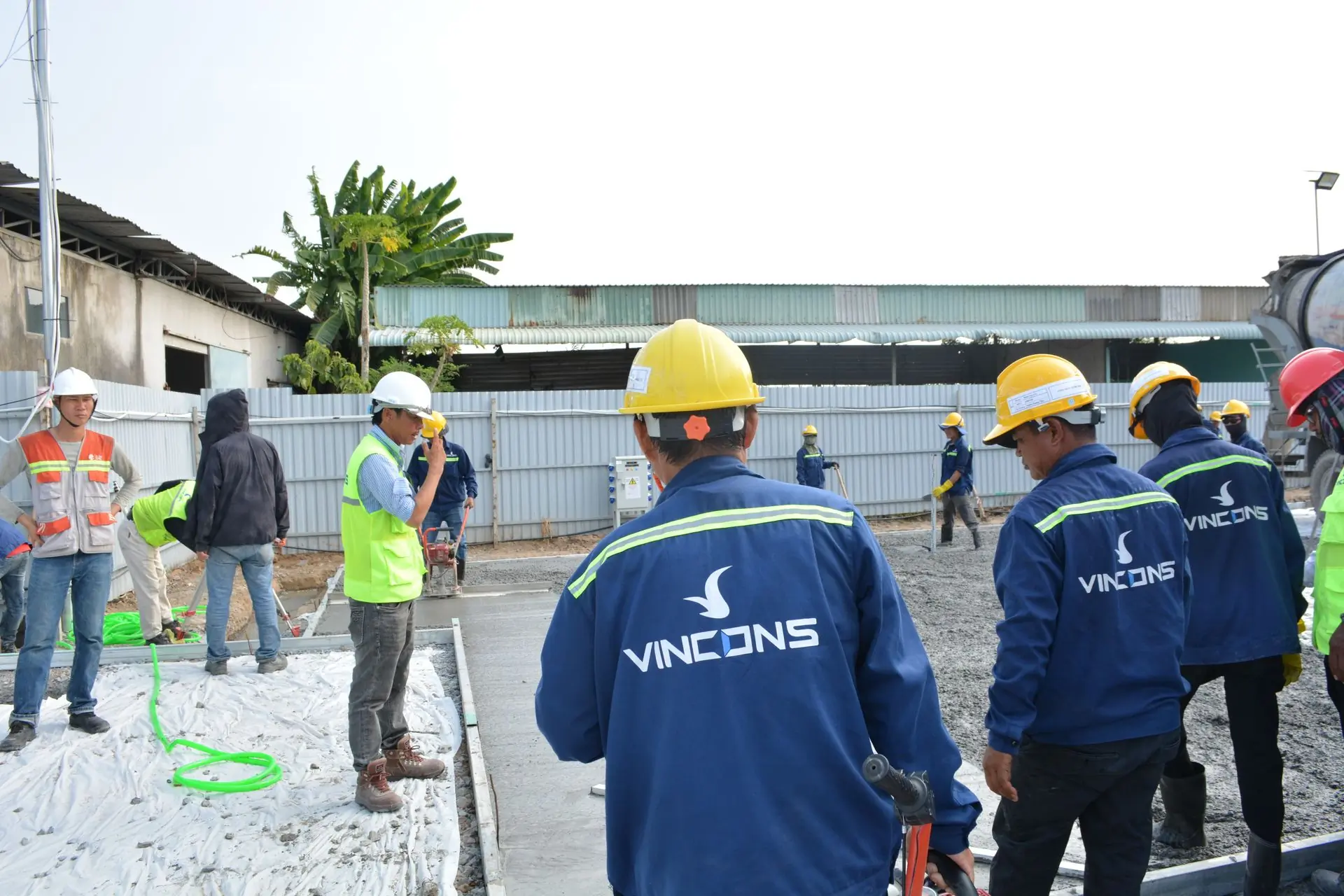 A site team walking a plot before a start