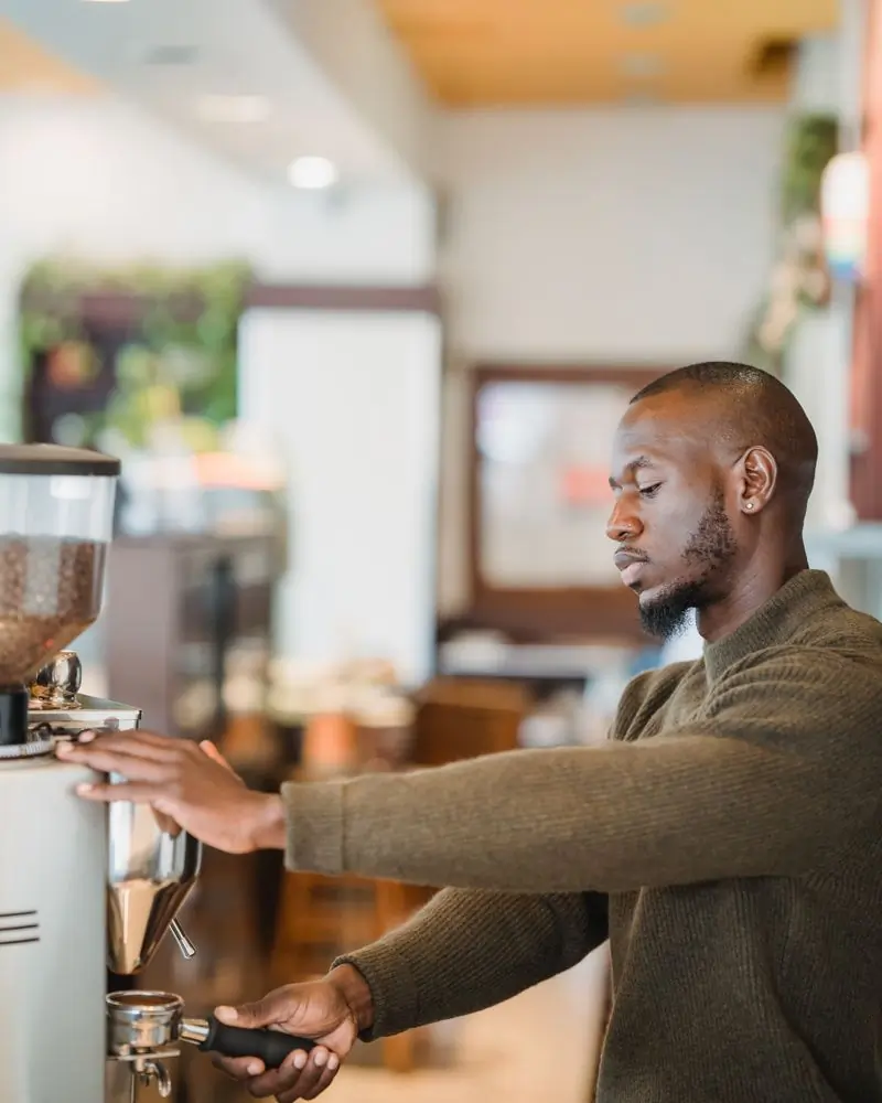 Nii grinding into the portafilter at the Labone bar