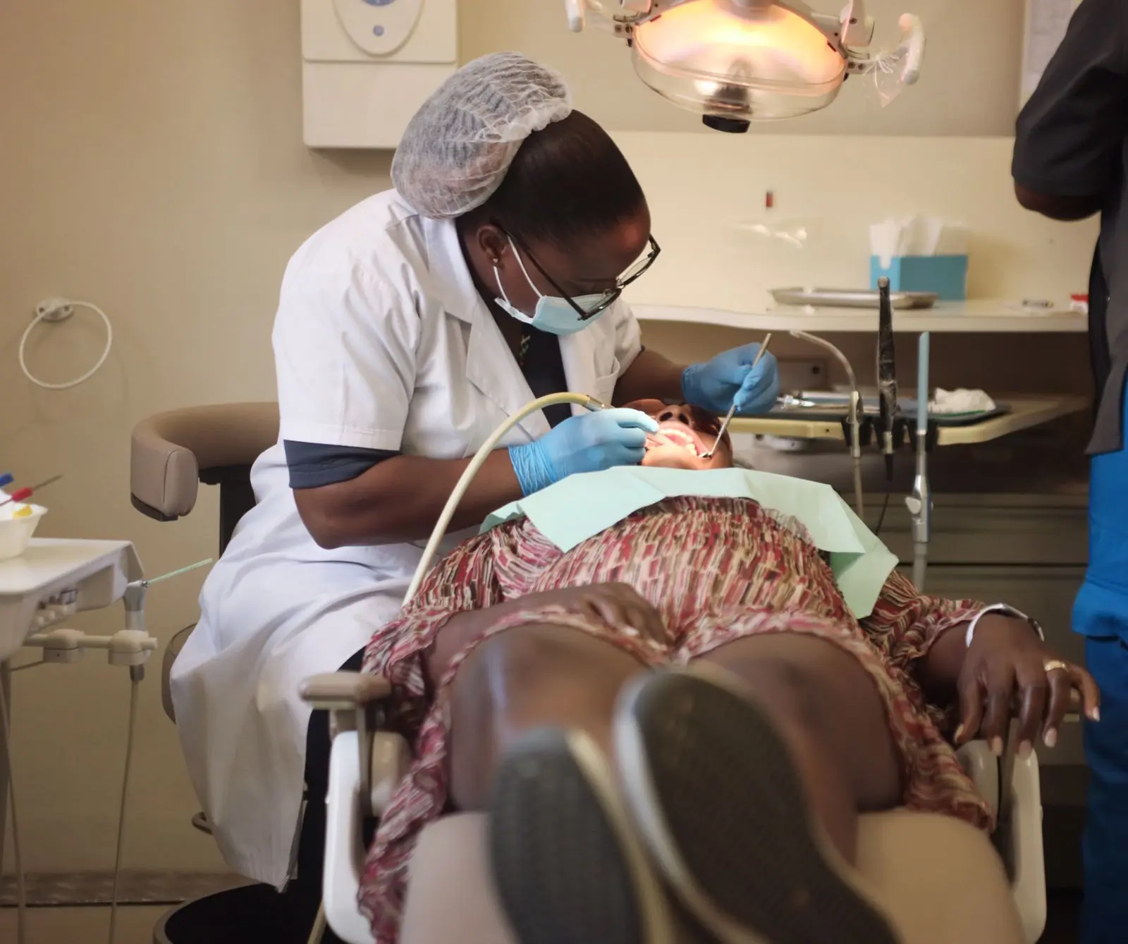A clinician treating a patient during one of the clinic's outreach days