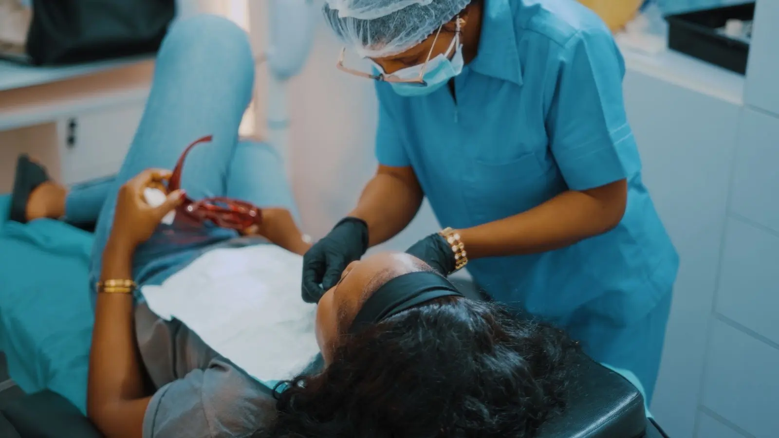 Dr. Naa Adjeley Quaye treating a patient