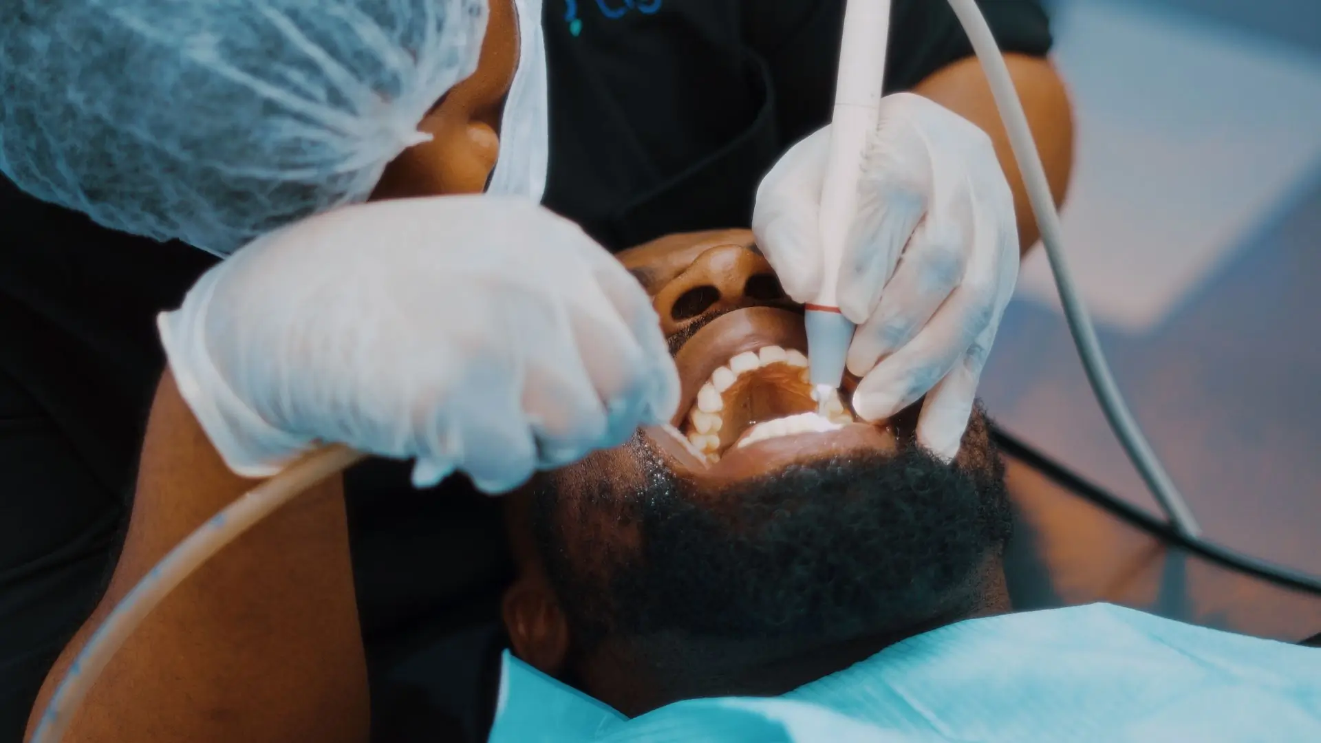 A dentist at work during a treatment at the clinic