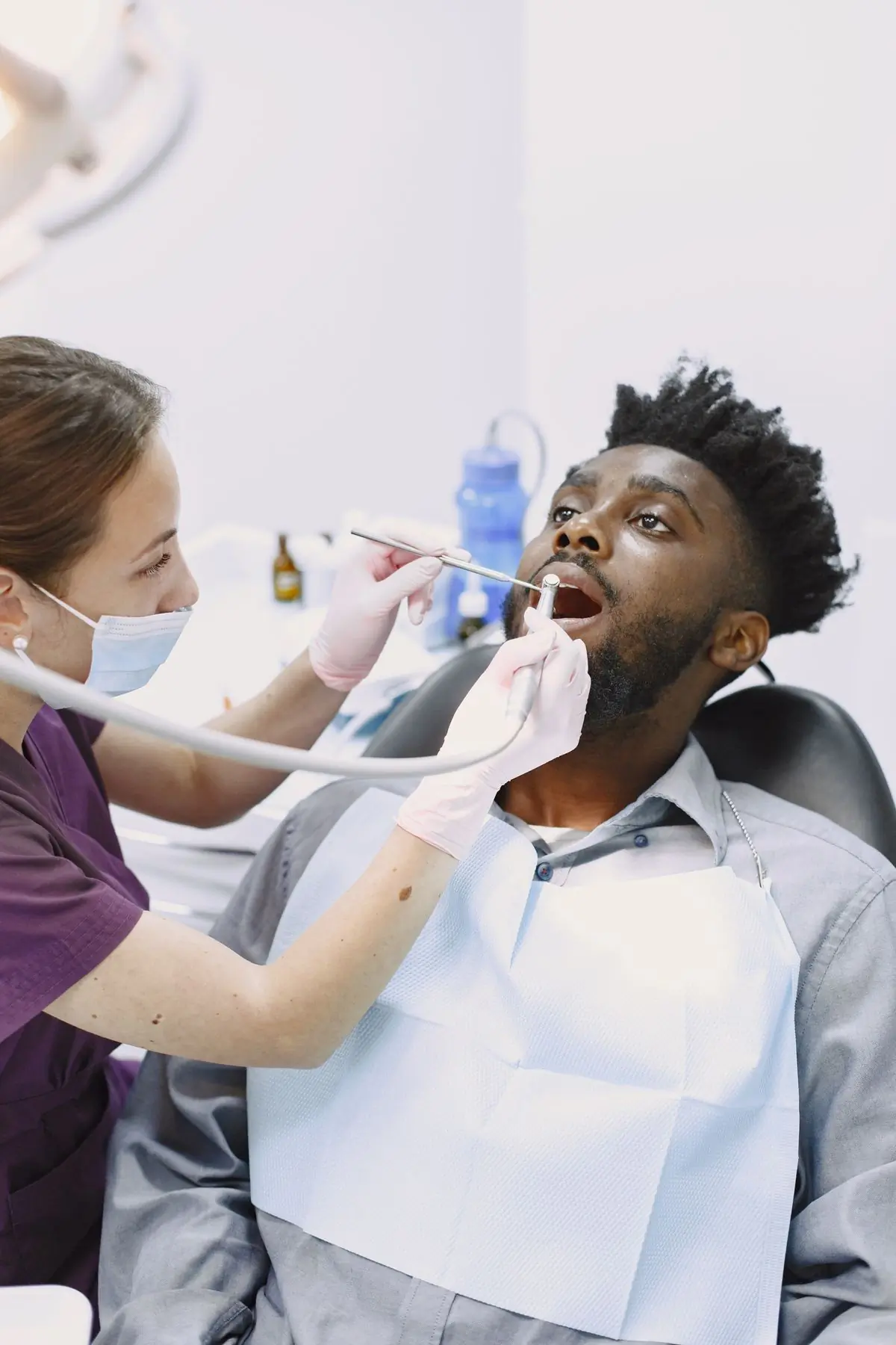 A routine examination in one of the clinic's surgeries
