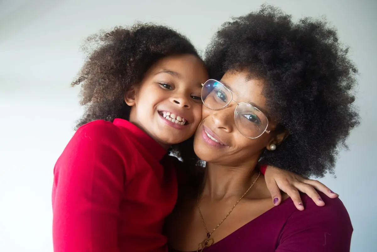 A mother and her daughter, both patients at the clinic